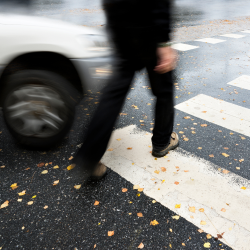 Car driving into path of pedestrian in a crosswalk