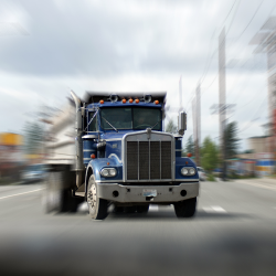 Tractor-trailer speeding down road