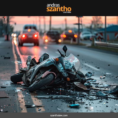 Motorcycle lying on the road with debris scattered after an accident in Albuquerque